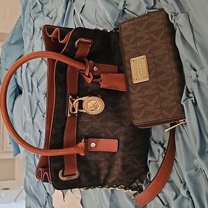 Authentic Michael Kors purse with matching wallet